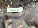 an image of a close up of a dress with a label on it