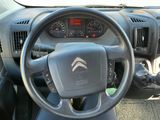 a steering wheel and dashboard of a small car