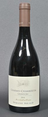 a bottle of wine that is sitting on a table
