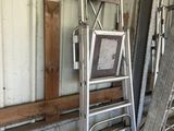 a ladder that is leaning against a wall in a garage