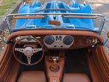 a close up of a car with a steering and dashboard