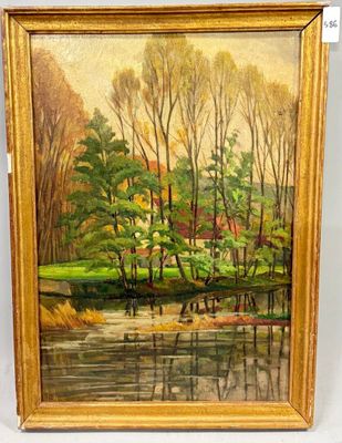 une peinture représentant une peinture d'arbres et d'eau, dans un cadre doré