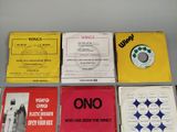 several different types of cd ' s sitting on top of a table