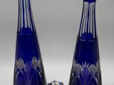 pair of cobalt blue glass decanters and a small glass box