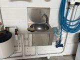 a sink and a toilet in a small room