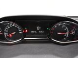 a close up of a car dashboard with a speedometer and gauges