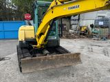 a picture of a yellow and black construction vehicle