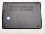 the back of a laptop with a blue sticker on it