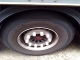 a close up of a flat tire on a semi truck