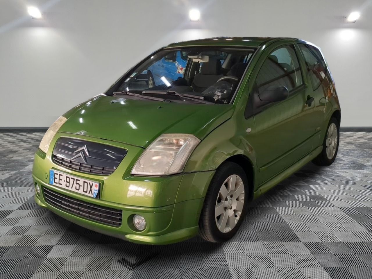 CITROEN - C2 1.4I VTR - ES - Mise en service: 24/06/2004 - Dysfonctionnement de la vitre avant droite. Véhicule grêlé.