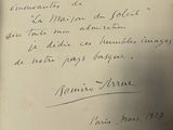 a letter written in french on a piece of paper