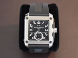 a black and silver watch with a black band