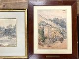 three framed pictures on the wall of a room