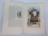an open book with a picture of a santa claus on it