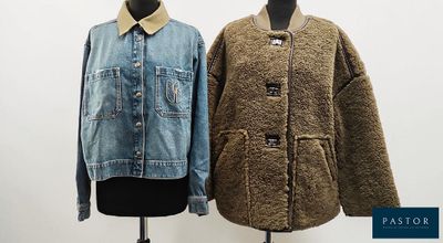 two jackets on a mannequin stand with a white background