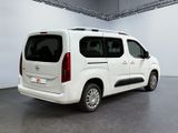 a white van that is parked inside of a building