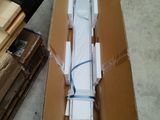 a cardboard box with a bunch of white boxes inside of it