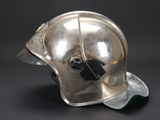 silver helmet on a black background with a black background