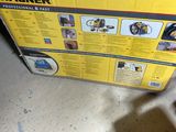 a box that has a hammer in it on the floor