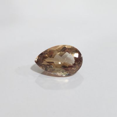 a brown diamond on a white surface