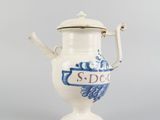 blue and white porcelain tea pot with a lid and handle