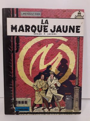 un livre avec la photo d'un homme et d'une femme