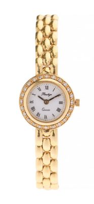 a close up of a gold wrist watch with a white dial