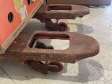 a box on the back of a pair of wrenches on the floor
