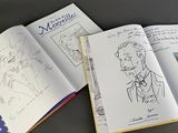 an open book with a drawing of a man in a suit and tie