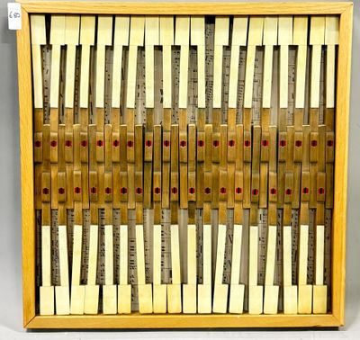 a wooden display case filled with lots of yellow and red notes