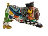 statue of a dachshund dog with a hat and a top hat