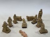 a lot of figurines that are sitting on a table