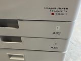 a white printer sitting on top of a counter