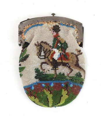 une photo d'un sac à main sur laquelle figure l'image d'un homme à cheval