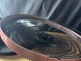 a fan that is sitting on top of a wooden table