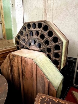 several pieces of wood are stacked on top of each other in a room