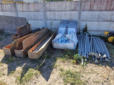 a lot of different types of pipes and pipes in the yard