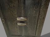 a wooden cabinet with a door and a plate on top of it