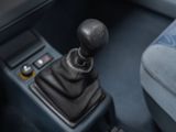 a close up of a car ' s interior with a gear stick