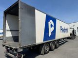 a semi truck that is parked in a parking lot