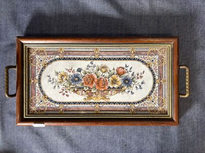 a picture of a wooden box with flowers on it