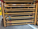 a lot of boards stacked on top of each other in a rack