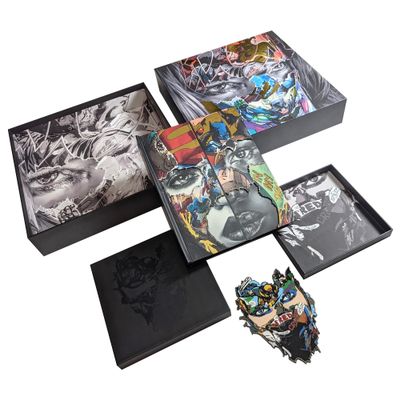 the box contains a collection of comic books and a comic book case