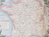 a map of france with a wreath of flowers on it