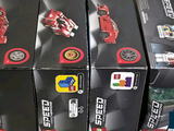 a lot of toy cars that are sitting in a box