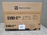 boxes of electronic devices are stacked on top of each other on a table