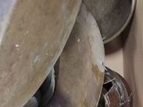 a box full of different types of pans and pans in it