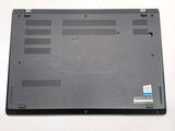 the bottom of a laptop with the bottom panel missing