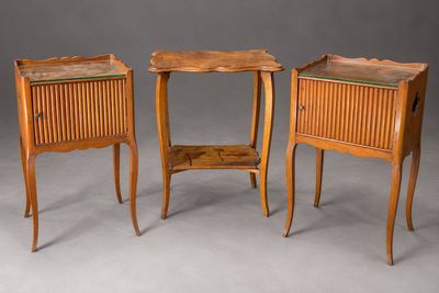 three pieces of furniture are sitting on a gray surface