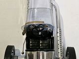 a model of a racing car on display on a table